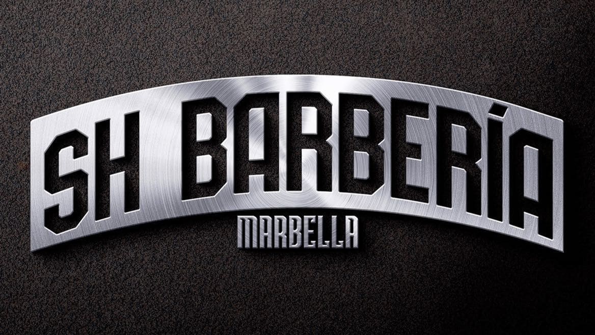 Rótulo de SH Barbería Marbella en acero cepillado